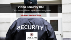 Video Security ROI by Vulcan Security Systems: Can a security camera replace a security guard? What our numbers show. Photo of the back of a man wearing black jacket with Security printed on the back.