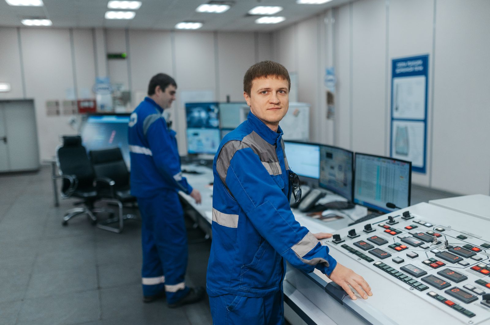 Security team monitoring distribution center camera feeds